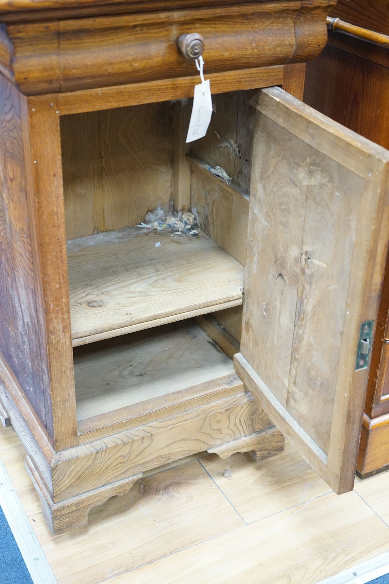 A 19th century French elm bedside cabinet with dummy drawer front, width 47cm, depth 36cm, height 76cm